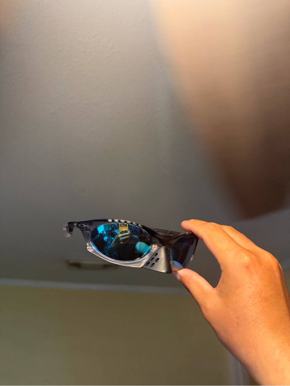 Oakley Black Frame Sunglasses with Blue Mirror Lenses Oakley